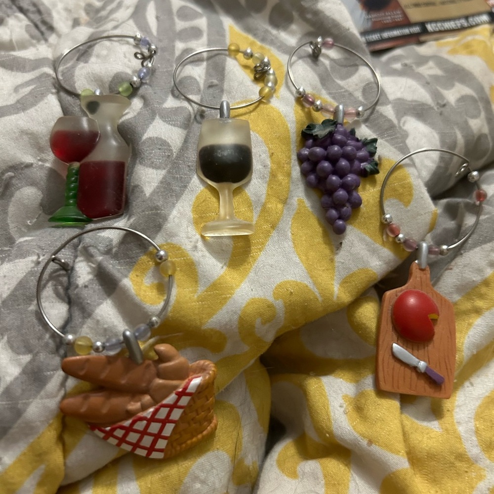 Vintage refrigerator magnets. Wine glasses, grapes, cutting board, bread basket
